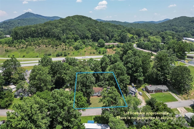 1631 Berkley St SW, Lenoir, NC 28645 - aerial view of property and surrounding area with a mountainous background and property parcel outlined