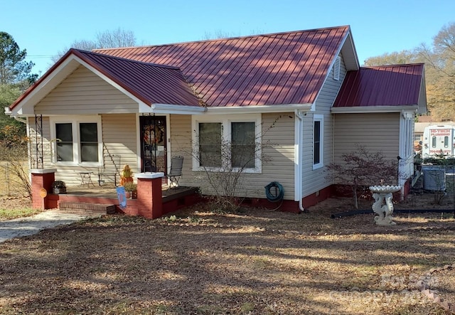4303 Grier St, Gastonia, NC 28056 - view of front of house with covered porch, a metal roof, and crawl space