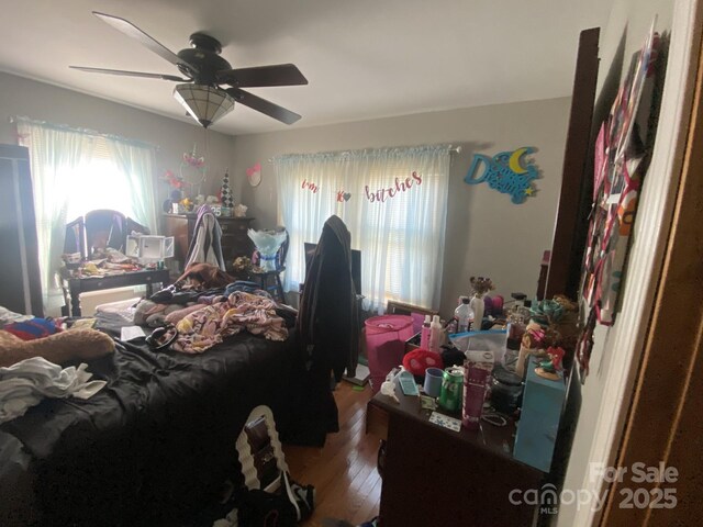 4303 Grier St, Gastonia, NC 28056 - bedroom with wood finished floors and a ceiling fan