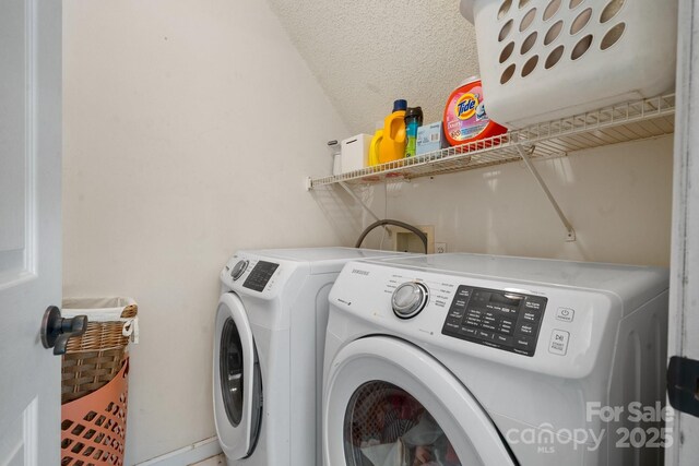 7648 Forest Oak Dr, Denver, NC 28037 - laundry area with separate washer and dryer and a textured ceiling
