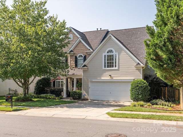 13930 Daltrey Ln, Charlotte, NC 28277 - traditional home with driveway and a garage
