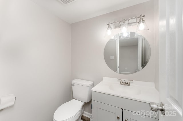 611 King Arthur Dr, Gastonia, NC 28056 - half bath featuring vanity and toilet