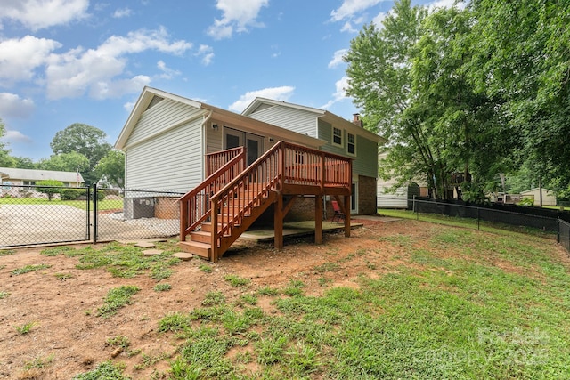 611 King Arthur Dr, Gastonia, NC 28056 - rear view of property with stairs, a deck, a fenced backyard, and a chimney