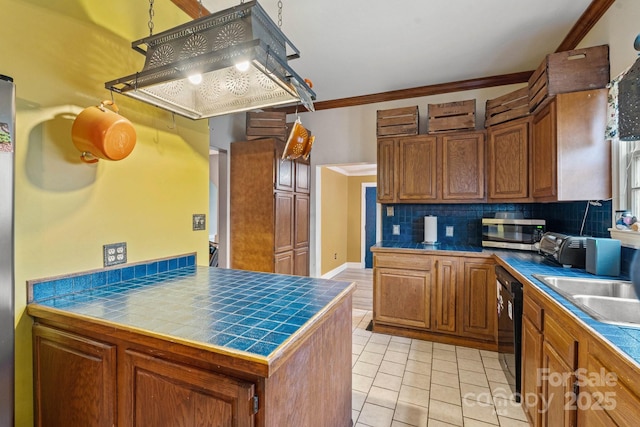 3809 Union Hill Rd, East Bend, NC 27018 - kitchen with stainless steel microwave, decorative backsplash, brown cabinets, black dishwasher, and light tile patterned floors