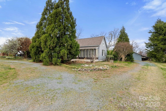 3809 Union Hill Rd, East Bend, NC 27018 - view of front of home featuring driveway and a shingled roof