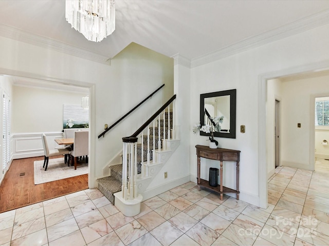 6546 Chestnut Grove Ln, Charlotte, NC 28210 - stairway featuring marble finish flooring, ornamental molding, and a chandelier