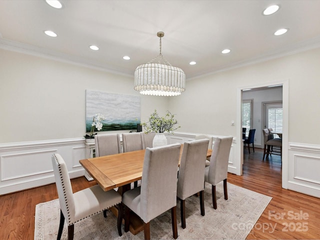 6546 Chestnut Grove Ln, Charlotte, NC 28210 - dining room featuring ornamental molding, light wood-style floors, a wainscoted wall, and recessed lighting