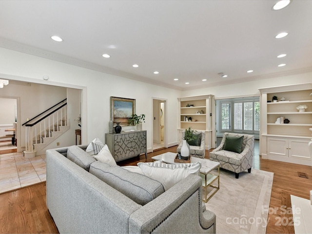 6546 Chestnut Grove Ln, Charlotte, NC 28210 - living room featuring ornamental molding, stairway, recessed lighting, and wood finished floors