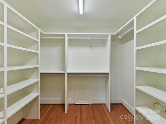6546 Chestnut Grove Ln, Charlotte, NC 28210 - spacious closet featuring wood finished floors