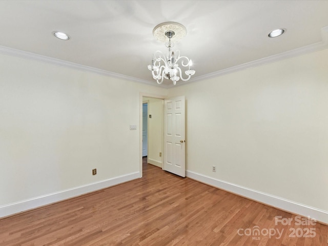 6546 Chestnut Grove Ln, Charlotte, NC 28210 - spare room featuring a chandelier, ornamental molding, light wood finished floors, and recessed lighting
