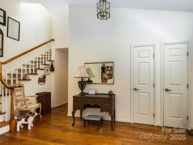 19 Jasmine Pl, Laurel Park, NC 28739 - corridor featuring stairway, wood finished floors, and a high ceiling