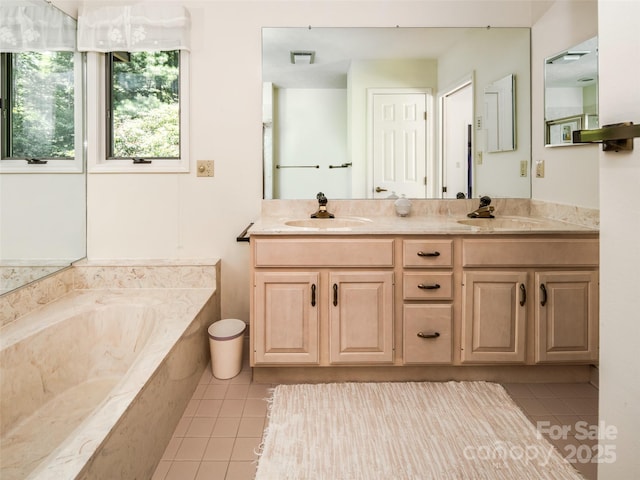 19 Jasmine Pl, Laurel Park, NC 28739 - full bathroom with tile patterned floors, a garden tub, and double vanity
