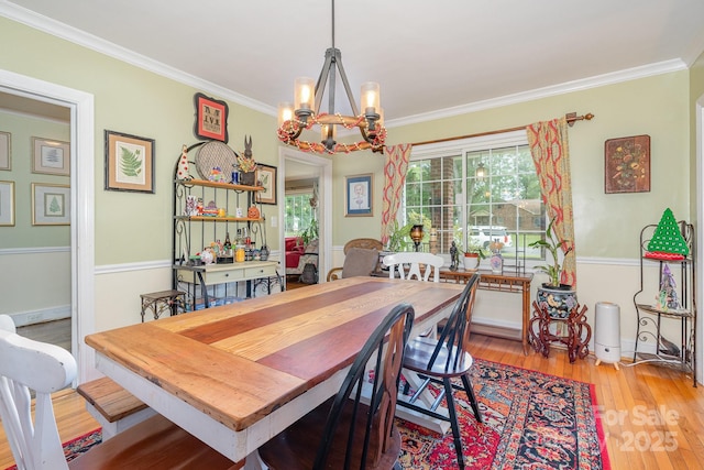 705 Townsend Ave, Gastonia, NC 28052 - dining room featuring a chandelier, wood finished floors, and ornamental molding