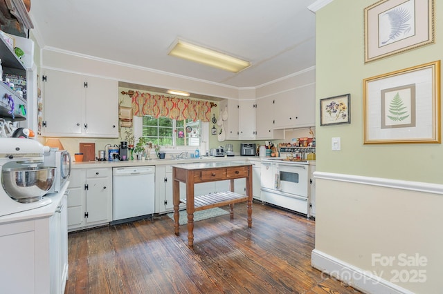 705 Townsend Ave, Gastonia, NC 28052 - kitchen with white appliances, white cabinets, dark wood finished floors, light countertops, and ornamental molding