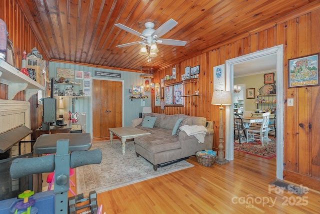 705 Townsend Ave, Gastonia, NC 28052 - living room featuring wood walls, crown molding, a ceiling fan, wood finished floors, and wood ceiling