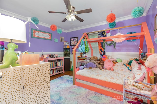 705 Townsend Ave, Gastonia, NC 28052 - bedroom featuring ornamental molding, a wainscoted wall, wood finished floors, and ceiling fan