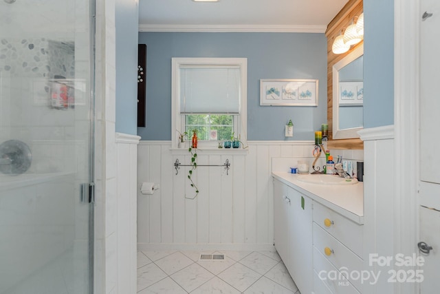705 Townsend Ave, Gastonia, NC 28052 - full bath with vanity, a stall shower, a wainscoted wall, marble look tile flooring, and ornamental molding