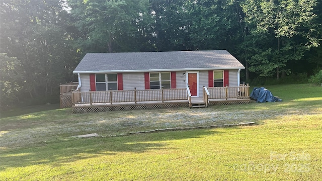 2611 Dallas Stanley Hwy, Stanley, NC 28164 - view of front facade with a front lawn, a wooden deck, and roof with shingles