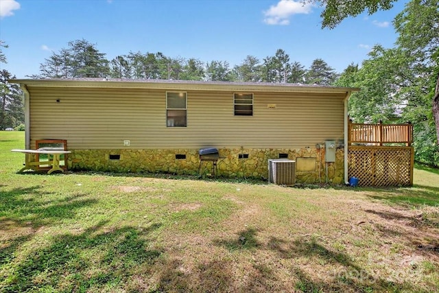 2611 Dallas Stanley Hwy, Stanley, NC 28164 - rear view of property with crawl space, a lawn, and a deck