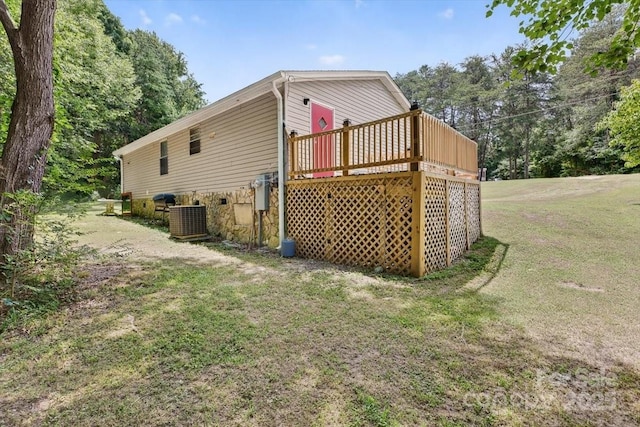 2611 Dallas Stanley Hwy, Stanley, NC 28164 - view of property exterior featuring a deck and a yard