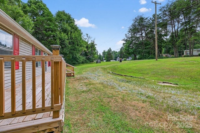 2611 Dallas Stanley Hwy, Stanley, NC 28164 - view of green lawn featuring view of scattered trees and a deck
