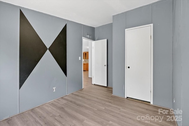 2611 Dallas Stanley Hwy, Stanley, NC 28164 - unfurnished bedroom with wood finished floors