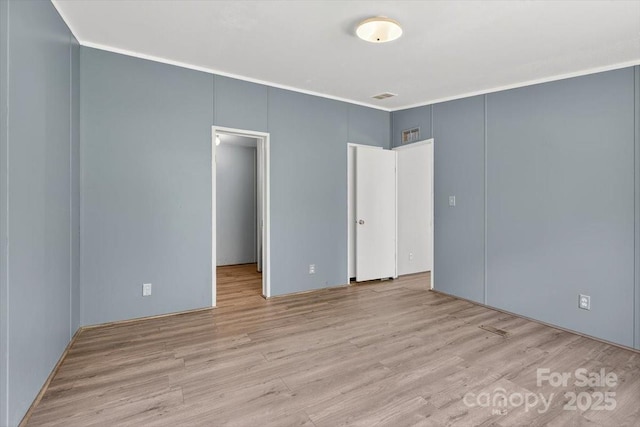2611 Dallas Stanley Hwy, Stanley, NC 28164 - empty room with wood finished floors and crown molding