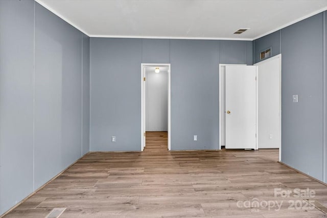 2611 Dallas Stanley Hwy, Stanley, NC 28164 - unfurnished bedroom featuring wood finished floors and ornamental molding