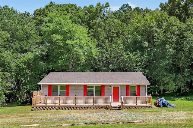 2611 Dallas Stanley Hwy, Stanley, NC 28164 - ranch-style house with a front yard, a wooden deck, and a forest view