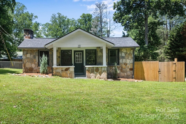 351 Dove Haven Ln, Hendersonville, NC 28791 - bungalow-style house featuring stone siding, a chimney, a shingled roof, and a gate