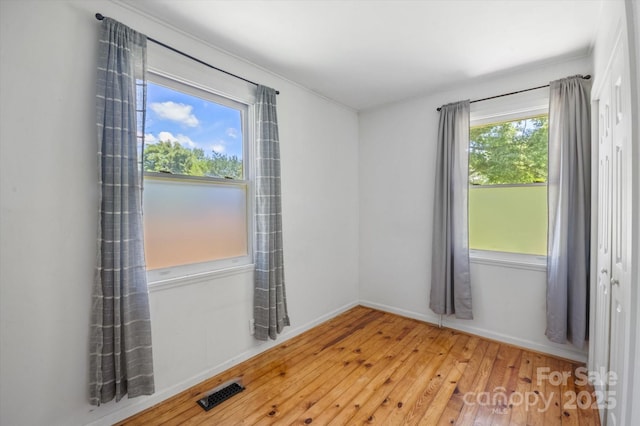 351 Dove Haven Ln, Hendersonville, NC 28791 - spare room with hardwood / wood-style floors and baseboards