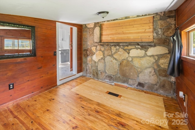 351 Dove Haven Ln, Hendersonville, NC 28791 - empty room with wooden walls and wood finished floors