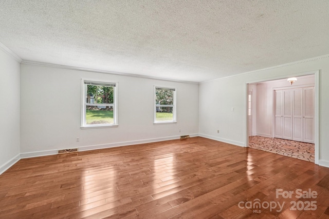 3333 Tanglewood Dr, Rock Hill, SC 29732 - unfurnished room with crown molding, wood finished floors, and a textured ceiling
