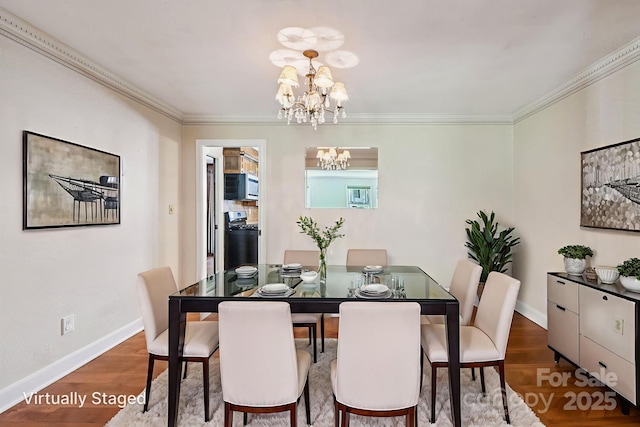 3333 Tanglewood Dr, Rock Hill, SC 29732 - dining area with a chandelier, wood finished floors, and ornamental molding