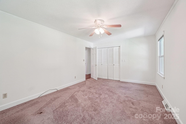 3333 Tanglewood Dr, Rock Hill, SC 29732 - unfurnished bedroom with carpet flooring, ceiling fan, and a closet
