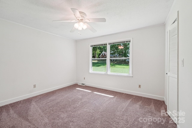 3333 Tanglewood Dr, Rock Hill, SC 29732 - unfurnished bedroom with carpet flooring, a closet, a textured ceiling, crown molding, and ceiling fan