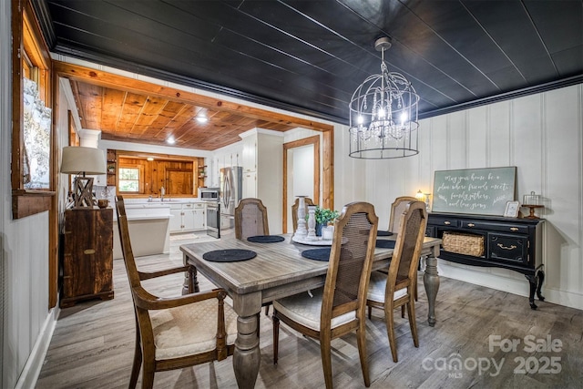 6939 Knob Ave, Connelly Springs, NC 28612 - dining area featuring light wood-style flooring, a chandelier, and wooden ceiling