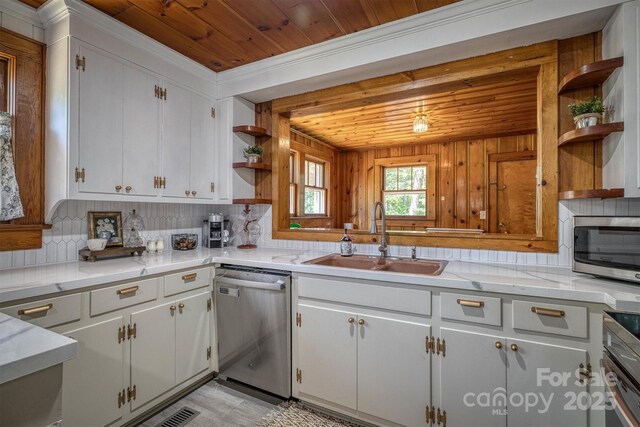 6939 Knob Ave, Connelly Springs, NC 28612 - kitchen with open shelves, appliances with stainless steel finishes, backsplash, wood ceiling, and white cabinets