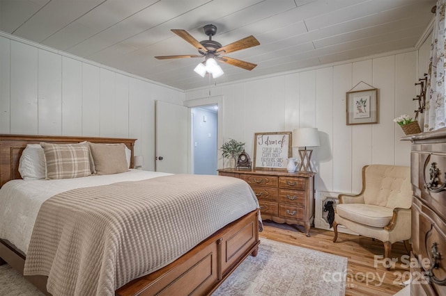 6939 Knob Ave, Connelly Springs, NC 28612 - bedroom with light wood-style flooring, ceiling fan, and crown molding