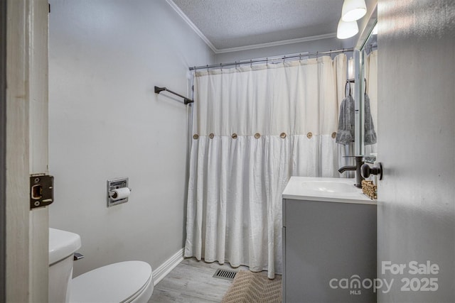 6939 Knob Ave, Connelly Springs, NC 28612 - bathroom with ornamental molding, vanity, wood finished floors, a textured ceiling, and a shower with shower curtain