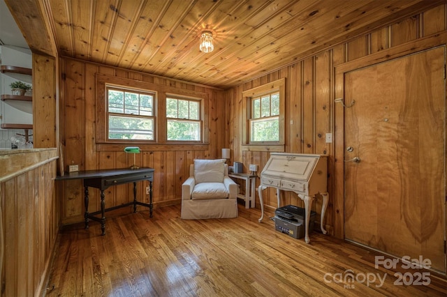 6939 Knob Ave, Connelly Springs, NC 28612 - sitting room featuring wood finished floors and wooden walls