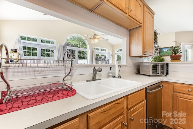 5128 Balsam Bark Ln, Fort Mill, SC 29708 - kitchen featuring vaulted ceiling, stainless steel dishwasher, light countertops, healthy amount of natural light, and a ceiling fan