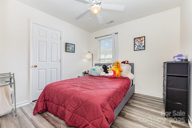 5128 Balsam Bark Ln, Fort Mill, SC 29708 - bedroom with wood finished floors and ceiling fan