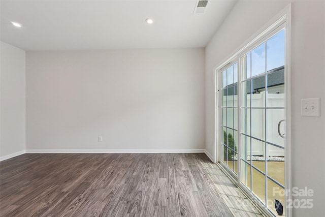 5037 Patton Dr, Gastonia, NC 28056 - empty room with dark wood-style floors and recessed lighting