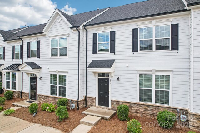 5037 Patton Dr, Gastonia, NC 28056 - townhome / multi-family property featuring stone siding