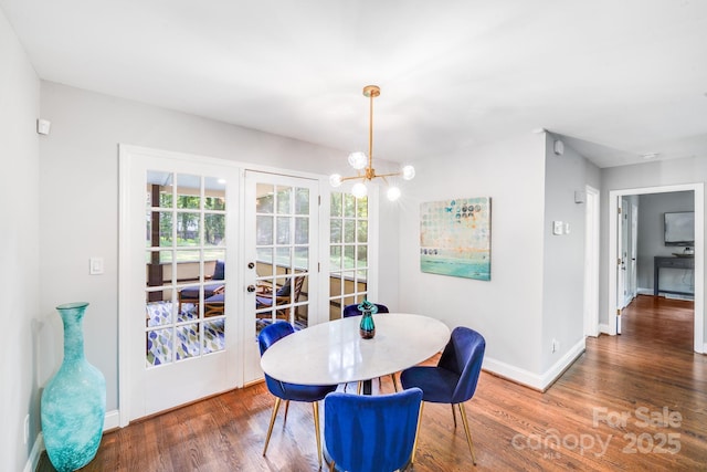 3920 Tilley Morris Rd, Matthews, NC 28105 - dining space with french doors, wood finished floors, and a chandelier