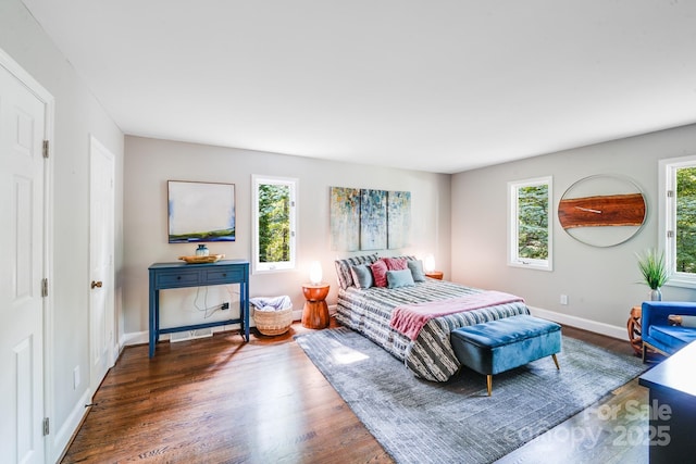 3920 Tilley Morris Rd, Matthews, NC 28105 - bedroom featuring wood finished floors and baseboards