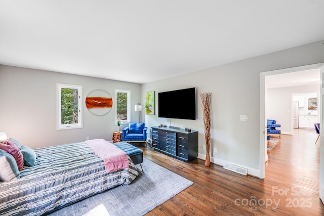 3920 Tilley Morris Rd, Matthews, NC 28105 - bedroom with wood finished floors and baseboards