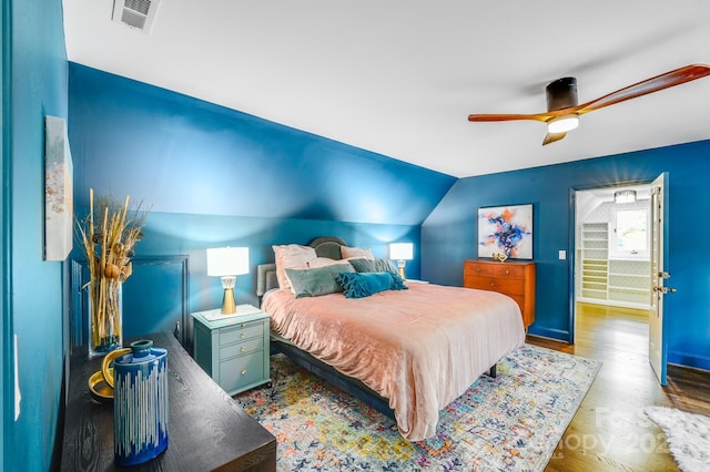 3920 Tilley Morris Rd, Matthews, NC 28105 - bedroom with wood finished floors, ceiling fan, and lofted ceiling