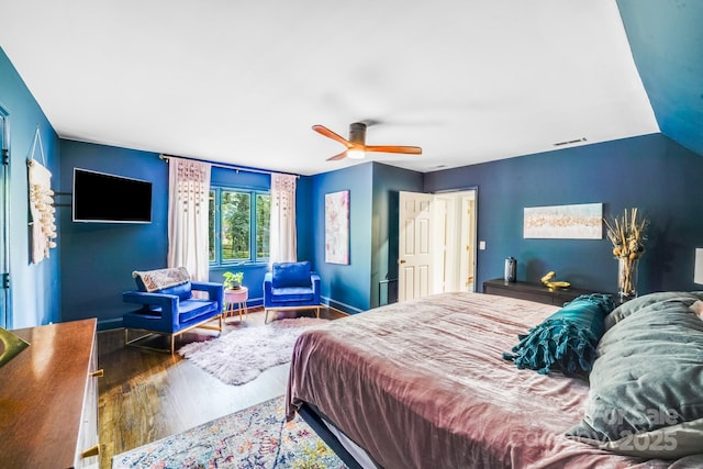 3920 Tilley Morris Rd, Matthews, NC 28105 - bedroom featuring wood finished floors and a ceiling fan